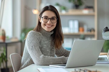 The businesswoman is working on her computer.