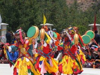 Monks and traditional mask dancing performances by monks - Powered by Adobe