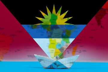 Sea transport of Antigua And Barbuda concept, bulk carrier or ships on sea, paper ship with Antigua 