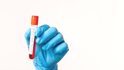 Doping Test of Olympic Games Athletes. Test tube with doping test of athlete's blood on white...