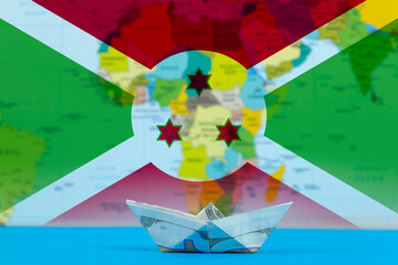 Sea transport of Burundi concept, bulk carrier or ships on sea, paper ship with Burundi flag