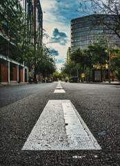 Perspective View Down a Quiet Barcelona Street Framed by Modern Buildings