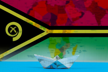Sea transport of Vanuatu concept, paper ship with Vanuatu flag, international transportation trade 