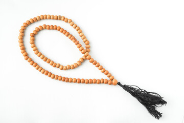 Buddhist wooden prayer beads Isolated on white background. Concept for Vesak Day and Enlightenment...