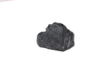 Obraz premium natural obsidian rough gem stone on the white background