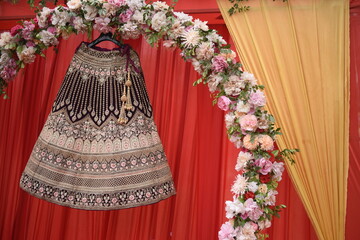traditional hindu indian  lehenga wedding dress of the bride hanging bridal gown