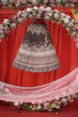 traditional hindu indian  lehenga wedding dress of the bride hanging bridal gown