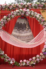 traditional hindu indian  lehenga wedding dress of the bride hanging bridal gown