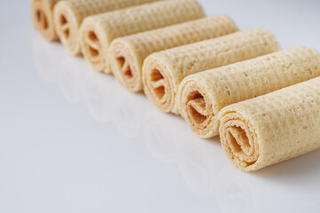 crispy dessert wafer rolls on a white background