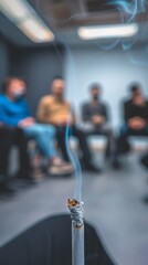 Lit cigarette in focus at a therapy session, emphasizing addiction issues