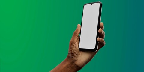 African-American hand with smartphone against green; great for app showcases