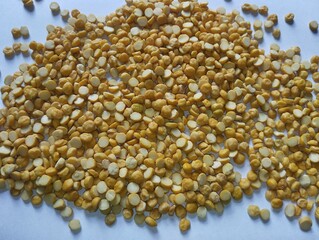 Yellow lentils with white background 