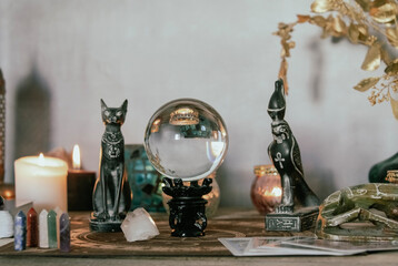 Esoteric Divination Setup with Tarot Cards and Crystal Ball.
