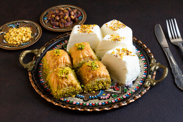 Traditional Turkish Maras Cut Ice Cream, designed with baklava on a round copper plate