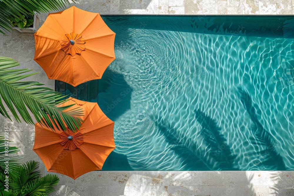 Poster overhead view of swimming pool with umbrellas