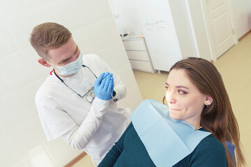 the dentist's appointment, the patient is afraid and does not allow an examination of the mouth