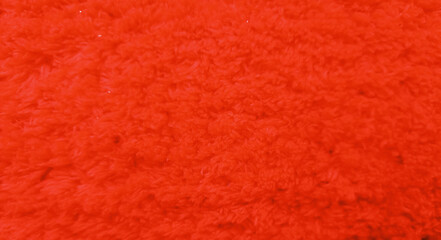 Red velvet fabric background in a luxurious style for graphic design