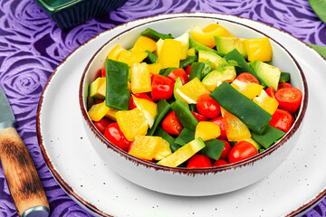 Fresh vegetable salad with runner beans in bowl