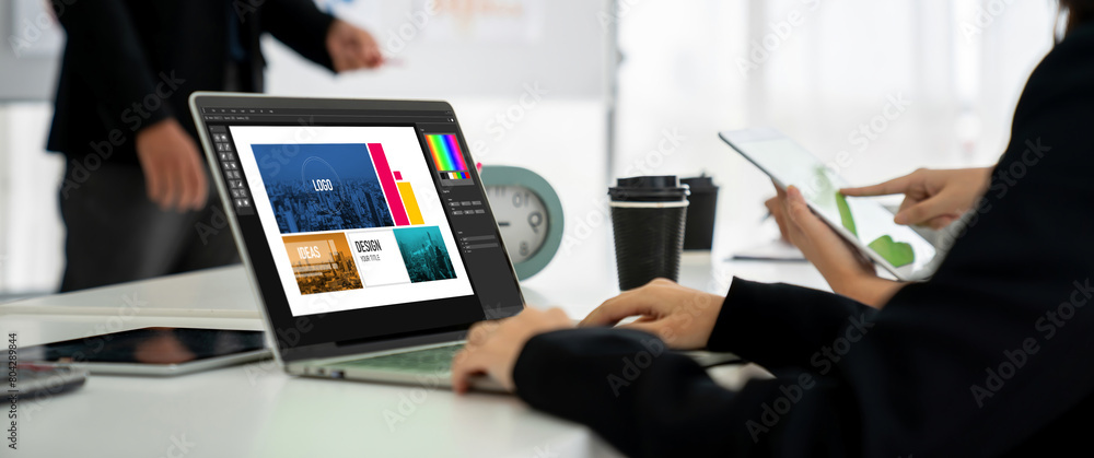 Aufkleber graphic designer software for modern design of web page and commercial ads showing on the computer s