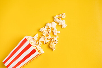Popcorn on a yellow background.Top view