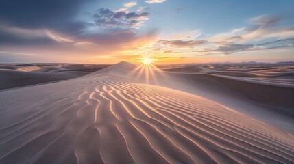 Sunset casting golden rays over rippling sand dunes, evoking a sense of peace and the vastness of the desert. Concept of natural beauty, solitude, and expansive landscapes.
