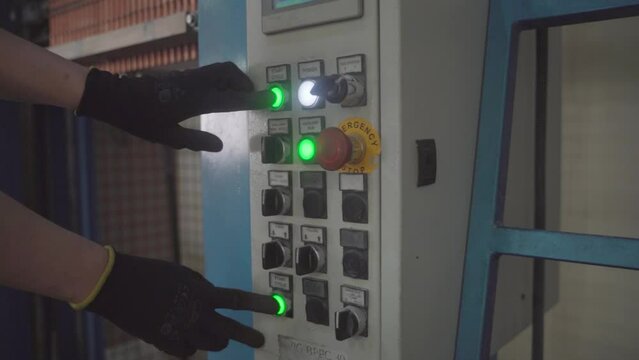 Factory production of heating element. Heating exchanger workshop. Inserting heat wire into copper tubes or pipes. Mass factory production.