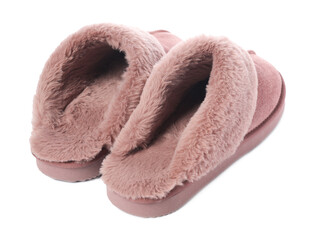 Pair of pink soft slippers isolated on white