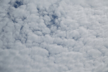 Close-up heavenly landscape with white clouds, top view; White clouds top view, bird's eye view;