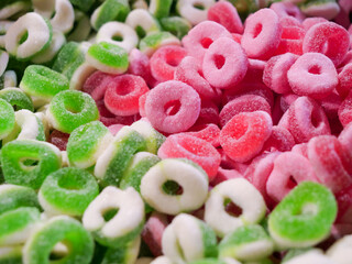 Sweets and Candy Close up - Indulge in the Sweet Avalanche, A Tempting Mountain of Colourful Fruity Confectionery Delights. Unhealthy diabetic and sugar addiction concept