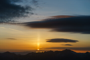 Sunrise at the summit of the mountain 