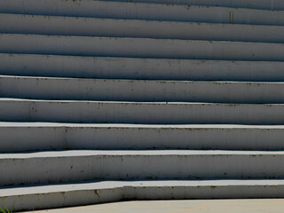 Harmonizing Light and Shadow. Symmetrical Contrast in Outdoor Concrete Staircases.