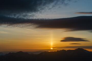 Sunrise at the summit of the mountain 