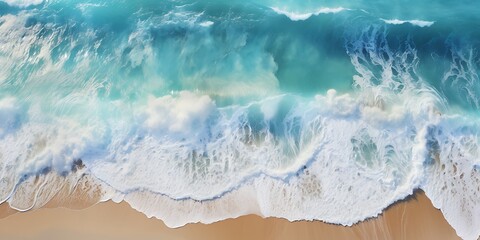 Aerial view of blue ocean wave on sandy beach. Top view