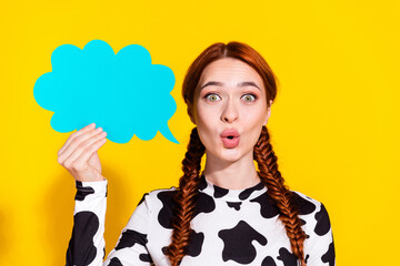 Photo of cute shocked woman wear cow skin print top rising talking cloud empty space isolated...