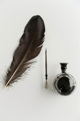 Feather quill, inkpot nearby