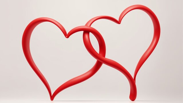 two intertwined hearts on a white background