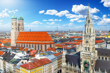 Elevated view of the skyline of Munich, Germany, with Frauenkirche and new city hall during a sunny day
