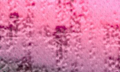 Pink abstract background textured with rough circle and square motifs.