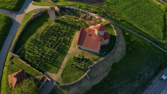 Aerial view of Serbian Orthodox Church of the Holy Apostles Peter and Paul, Ras and gravestones.The oldest church in Serbia. Novi pazar, Serbia 29.04.2024 