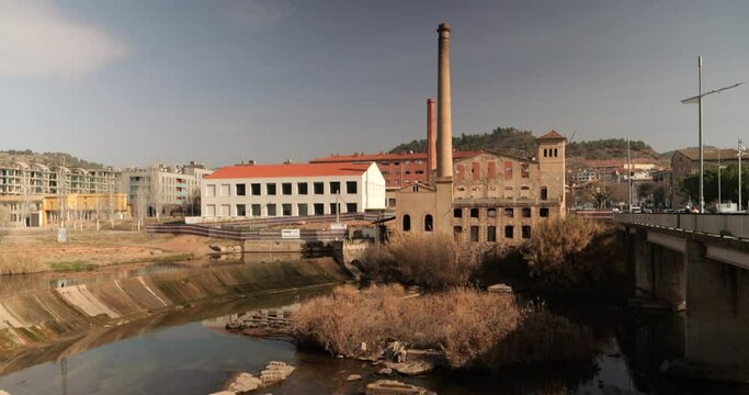 Sallent town in Catalonia. The river as it passes through an industrial town
