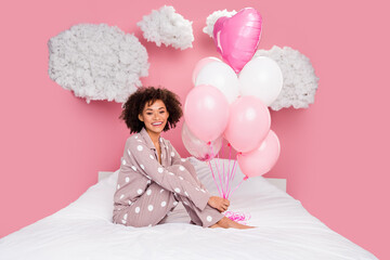 Photo of funky sweet lady wear pajama relaxing bed enjoying birthday morning isolated pink color...