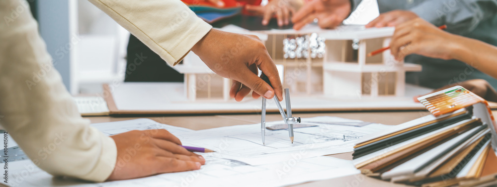 Poster professional architect team select sustainable house materials while skilled engineer using divider 