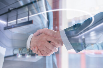Businessmen handshake with partner greeting dealing merger and acquisition, business joint venture concept, teamwork and successful business with blurred background