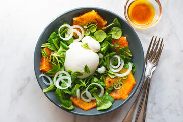 Burrata is a Pulian Italian cheese with a creamy base and a salad of red Sicilian oranges. Summer...