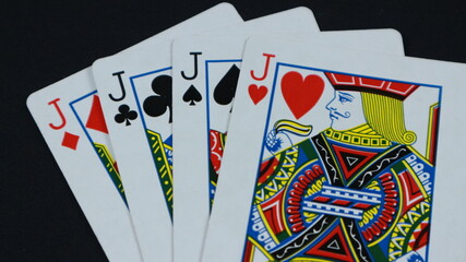 4 Jack in a row - Playing Cards, Isolated on black
