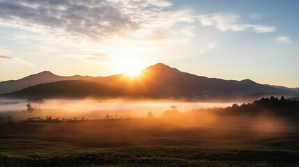 Fototapeta premium Sunrise in the mountains. Foggy landscape.