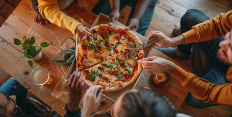 close up of diverse friends sharing pizza with hands, top view on table