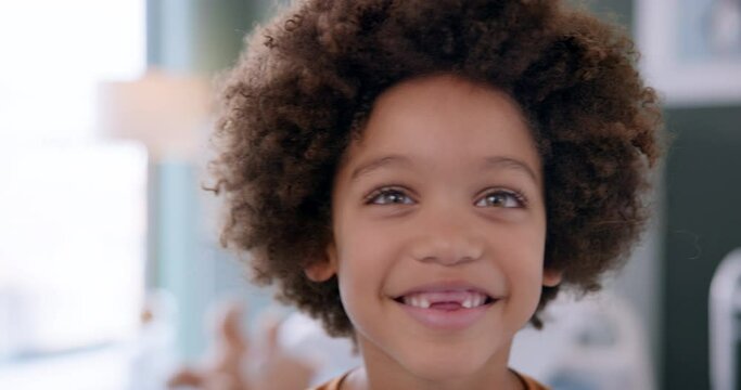 Child, face and smile or teeth dentist at clinic for healthcare for dental hygiene, wellness or check up. Boy, happiness and missing tooth for orthodontics results or youth, cavity or appointment