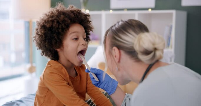 Doctor, child and mouth check in hospital with examination, sore throat or consultation for healthcare support. Pediatrician, boy or medical expert with tongue spatula for treatment, help or medicare