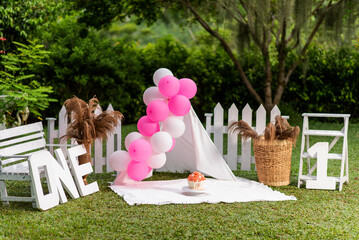 Wonderful close up of first birthday decoration with cake